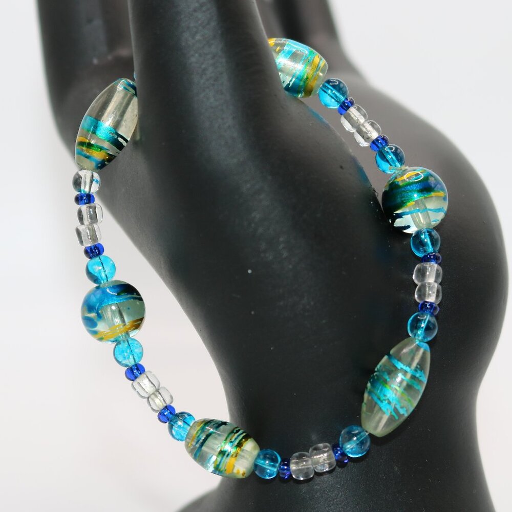 Stretchy Blue And Clear Glass Beads Bracelet